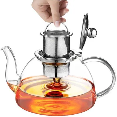 Productafbeelding van Unyqoos® Glazen theepot, 1300 ml, met afneembaar roestvrijstalen zeefje met laserperforaties en deksel, gemaakt van borosilicaatglas, met druppelvrije tuit, geschikt voor gas- en elektrische fornuizen (niet geschikt voor inductie)