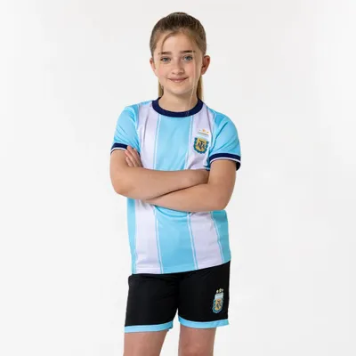 Immagine prodotto di Messi Argentina Kit Casa Bambini - Completo Calcio con Maglia e Pantaloncini - Merchandising Ufficiale AFA Fan - Taglie da 116 a 164