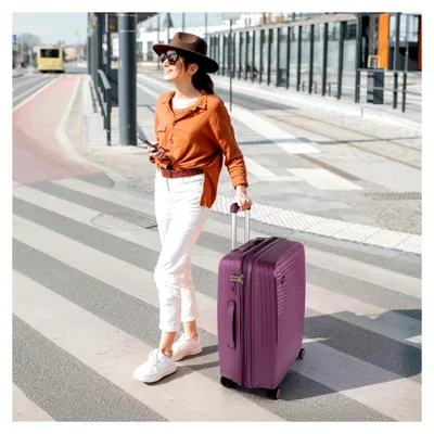 Produktbild von XL Hartschalenkoffer mit Rollen, ideal für lange Reisen, lila