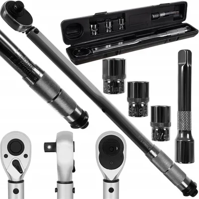 A collection of torque wrenches and sockets on a white background.