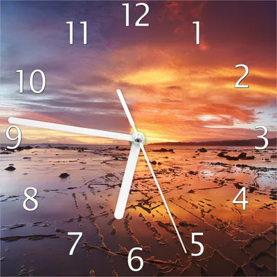 Produktbild von Wallario Design Wanduhr Wattwanderung am Meer bei Sonnenuntergang aus Echtglas, Größe 20 x 20 cm