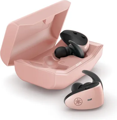 A pair of pink and black true wireless stereo earbuds with their charging case.