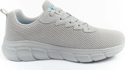 A single shoe is shown from the side against a white background.