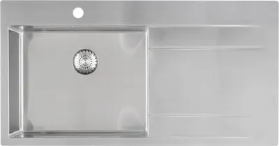 A top-down view of a stainless steel kitchen sink with a drainer.