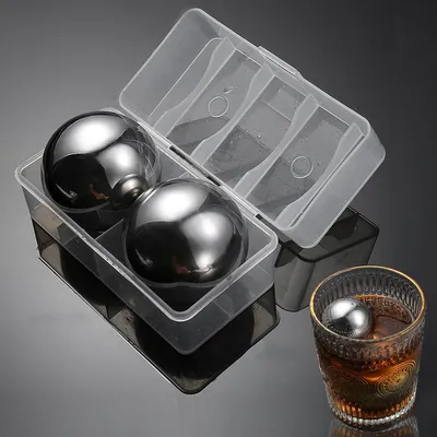 Produktbild von Whisky-Steine – 2 Stück – Wiederverwendbare Kühlsteine – Gefrorene Eisbälle aus Edelstahl mit PP-Box – 55 mm Durchmesser – Schnelle Kühlung (silberfarben)