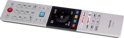 A close-up, angled view of a Toshiba remote control against a white background.