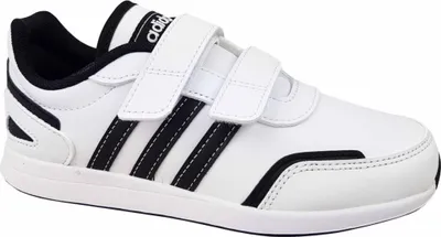 A white Adidas shoe with black stripes and black trim, shown from the side.