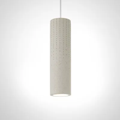 A cylindrical pendant light fixture with a textured, speckled surface and small perforations, hanging from a white cord against a gradient background.