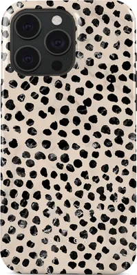 A close-up view of a phone case with a dalmatian-like pattern.