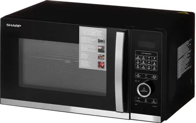 A black Sharp microwave oven shown from a three-quarter front angle on a white background.