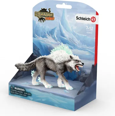 A toy wolf figure in its packaging, set against an icy background.