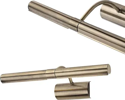 A close-up, studio shot of a bronze and silver picture light, presented against a white background. The image is split into two views, showing the light from different angles.