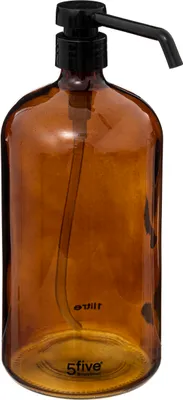 A brown glass dispenser with a black pump.