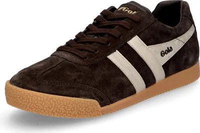 A studio shot of a single brown Gola sneaker.