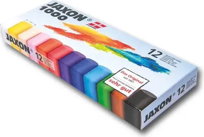 A box of Jaxon 1000 oil pastels, showing the colorful pastels arranged in a row.