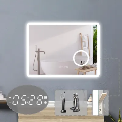 A bathroom mirror with integrated LED lighting and a digital clock display, shown above a vanity with bathroom accessories.