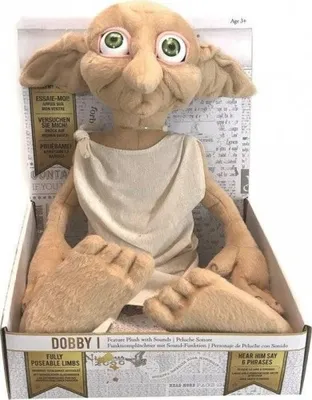 A plush toy of Dobby from Harry Potter is sitting in its retail packaging.