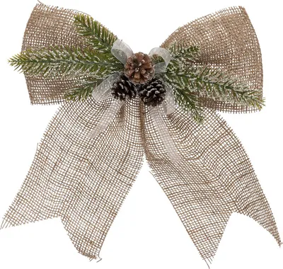 A decorative bow made of burlap with pine sprigs and pinecones.