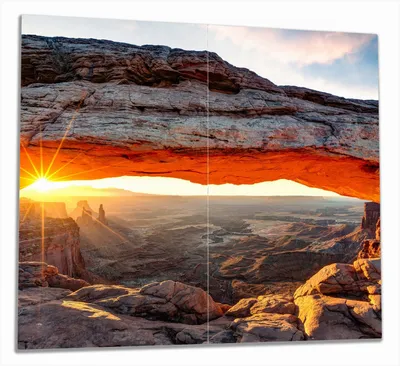 Produktbild von Wallario Herdabdeckplatte aus Glas, Größe 60 x 52 cm 2-teilig, Motiv Sonnenstrahl am Horizont  Leuchtende Felsspalte
