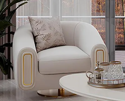 Produktbild von r Sessel mit goldenen Details für stilvolle Wohnzimmer