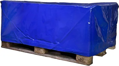 A blue tarp covering a pallet of goods.