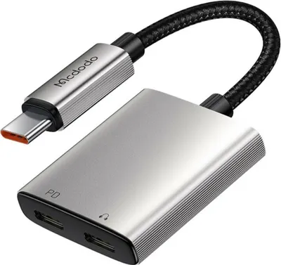 Produktbild von MCDODO Audioadapter 2in1 USB-C auf 2x USB-C mit PD 60W Schnellladen, 3A, verlustfreiem Klang. Kompatibel mit Bedientasten-Kopfhörern & USB-C Geräten (Smartphones, Tablets, Laptops). Nylon-Aluminiumlegierung, 12,5 cm, 15g. Modell CA-5570.