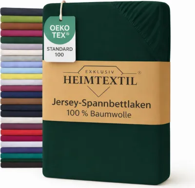 A stack of folded fabric sheets in various colors is shown next to a folded green sheet with a product label.
