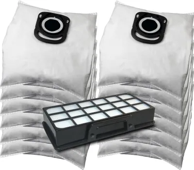 A stack of vacuum cleaner bags and a filter.