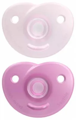 Two pink pacifiers are shown against a white background.