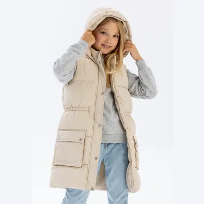 Immagine prodotto di Gilet imbottito color crema con cappuccio, marca Minoti, per bambine. Gilet caldo, foderato, ideale per l'autunno e l'inverno