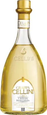 A clear studio shot of a bottle of Grappa.