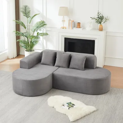 Imagen del producto de Sofá modular en forma de L de 220 cm, color gris, con reposabrazos curvos, 3 cojines, ideal para salones y espacios de estar