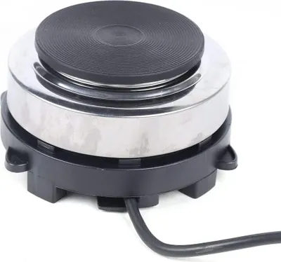 A close-up studio shot of a portable electric hot plate.