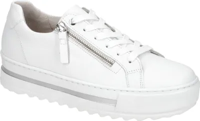 A white leather sneaker with a zipper detail and laces, shown from the side against a white background.