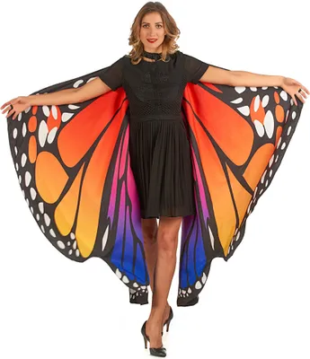 A woman wearing a black dress and butterfly wings.