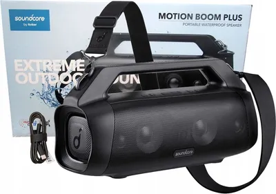 A black Anker Motion Boom Plus portable waterproof speaker is shown in front of its packaging.