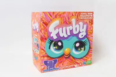A product box for a Furby toy, featuring a colorful, fuzzy design and the Furby logo.