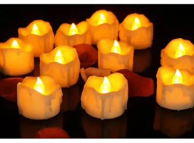 Productafbeelding van 12 LED Flikkerende Vlamloze Kaarsen voor Halloween en Feestdecoratie - Warm Licht