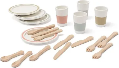 A collection of toy dishes, cups, and cutlery arranged on a white background.