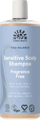 A product shot of a shampoo bottle against a light blue background.