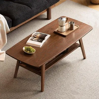 Imagen del producto de Mesa de centro de madera maciza de roble, mesa para el salón con 2 niveles y espacio de almacenamiento, mesa auxiliar para el sofá, 120 x 56 x 44 cm, color nogal