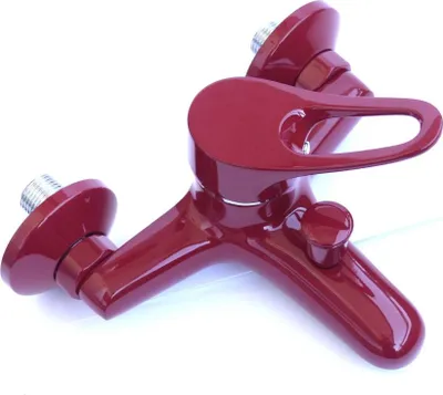 A red bathtub faucet is shown against a white background.