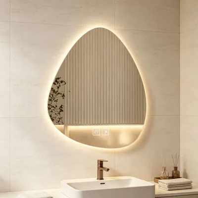 Zdjęcie produktu dla Lustro LED do łazienki Zimilo, asymetryczne, 50x70 cm: przyciski dotykowe, 3 barwy światła, możliwość regulacji jasności, powłoka antyfogowa i szkło odporne na rozbicie, idealne do nowoczesnych łazienek
