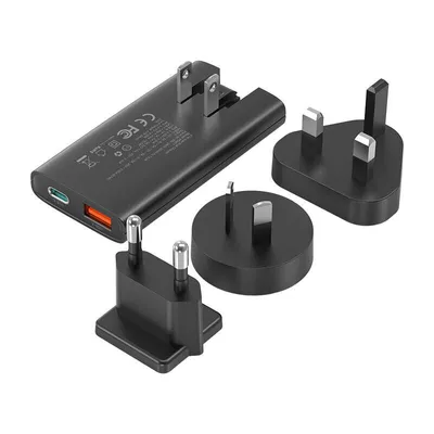 Produktbild von Choetech Schnellladegerät mit Länderadapter, Fast Charger (67W) , USB-C + USB-A Output 45W + 10.5W Schwarz