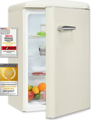 A cream-colored retro refrigerator with its door slightly ajar, revealing fruit and some containers inside. Several award badges are affixed to the left side of the refrigerator.