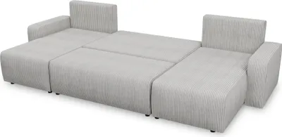 A beige U-shaped sofa with a cord fabric texture is shown from a slightly elevated side angle against a white background.