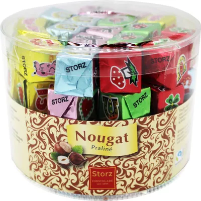 A clear, well-lit product shot of a round container filled with individually wrapped chocolates.