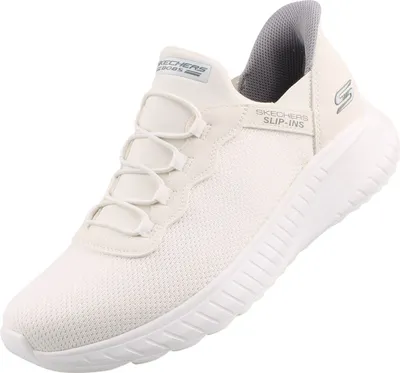 A white Skechers sneaker is shown against a white background.