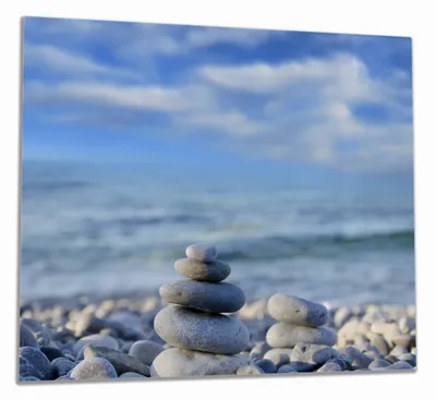 Produktbild von Wallario Herdabdeckplatte aus Glas, Größe 60 x 52 cm 1-teilig, Motiv Steinstapel am Strand