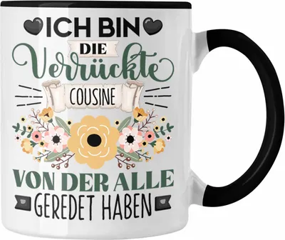 Produktbild von Trendation - Cousine Tasse Geschenk Lustiger Spruch Geschenkidee Ich Bin Die Verrückte Cousine Von Der Alle Geredet Haben (Schwarz)